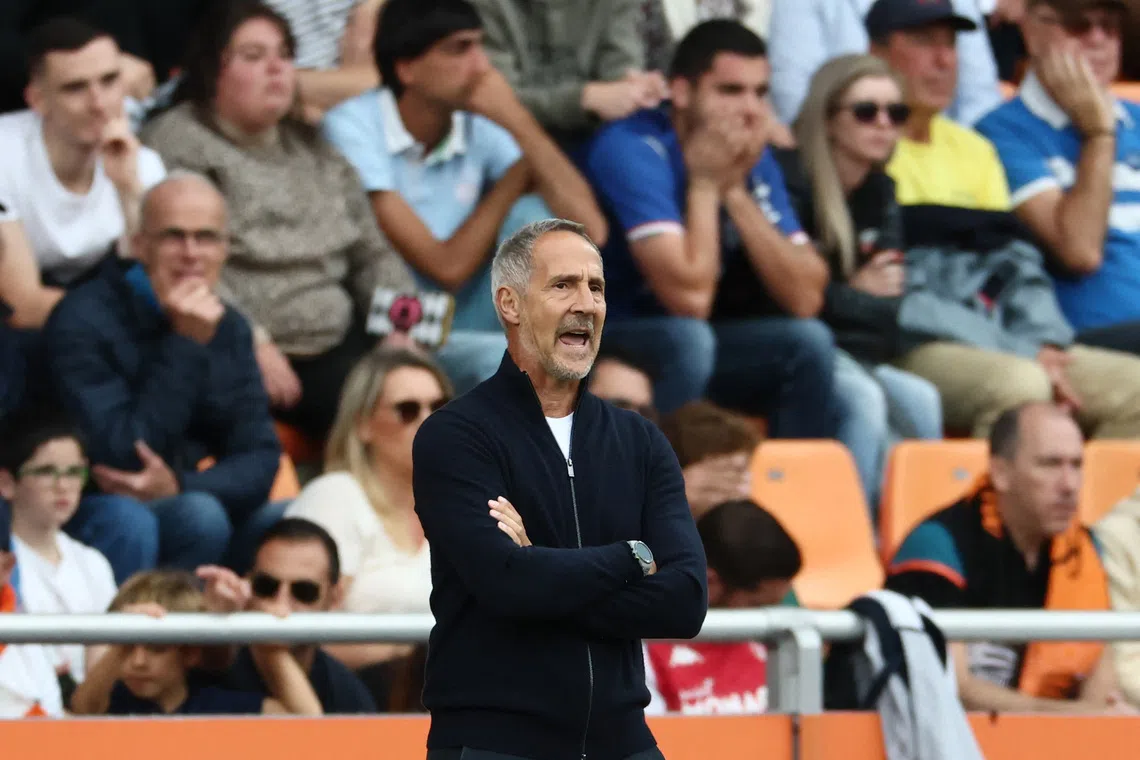 Soccer Football - Ligue 1 - FC Lorient v AS Monaco - Stade du Moustoir, Lorient, France - September 27, 2025 AS Monaco coach Adi Hutter reacts REUTERS/Stephane Mahe