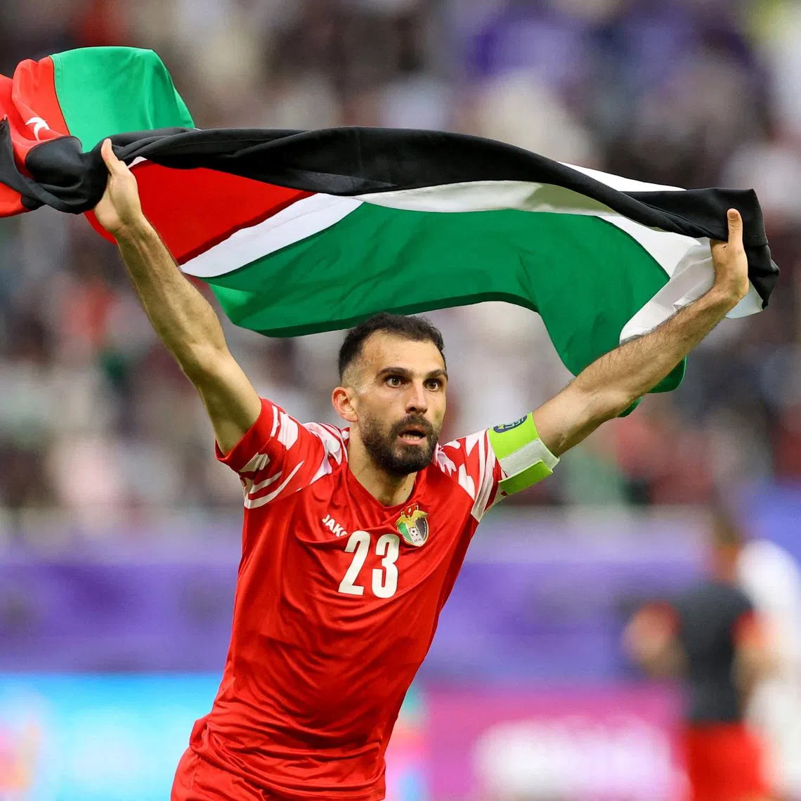 FILE PHOTO: Soccer Football - AFC Asian Cup - Round of 16 - Iraq v Jordan - Khalifa International Stadium, Al Rayyan, Qatar - January 29, 2024 Jordan's Ehsan Haddad celebrates after the match REUTERS/Ibraheem Al Omari/File Photo