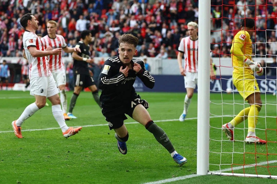 Soccer Football - Bundesliga - SC Freiburg v Bayern Munich - Europa Park Stadion, Freiburg, Germany - April 4, 2026 Bayern Munich's Lennart Karl celebrates scoring their third goal REUTERS/Kai Pfaffenbach