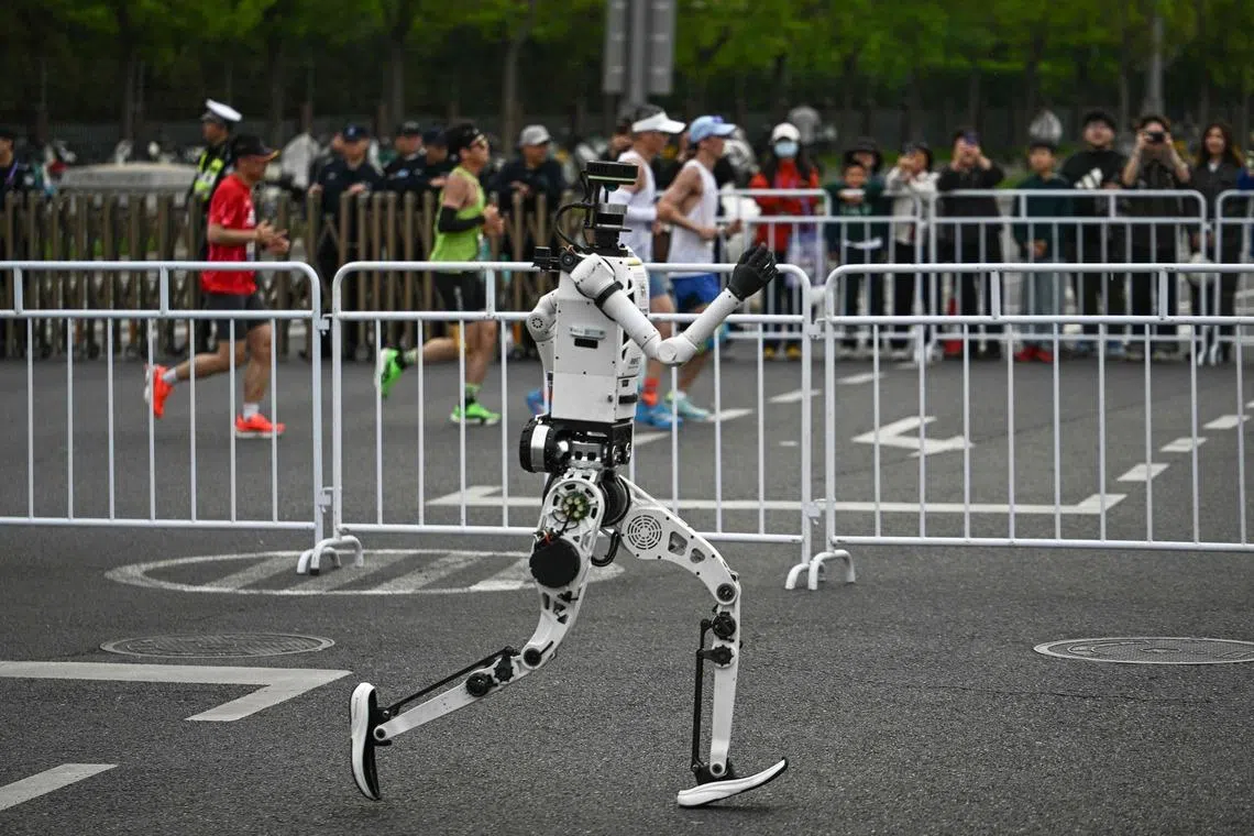 A robot running in the second Beijing E-Town Half Marathon and Humanoid Half Marathon in Beijing, China, on April 19.