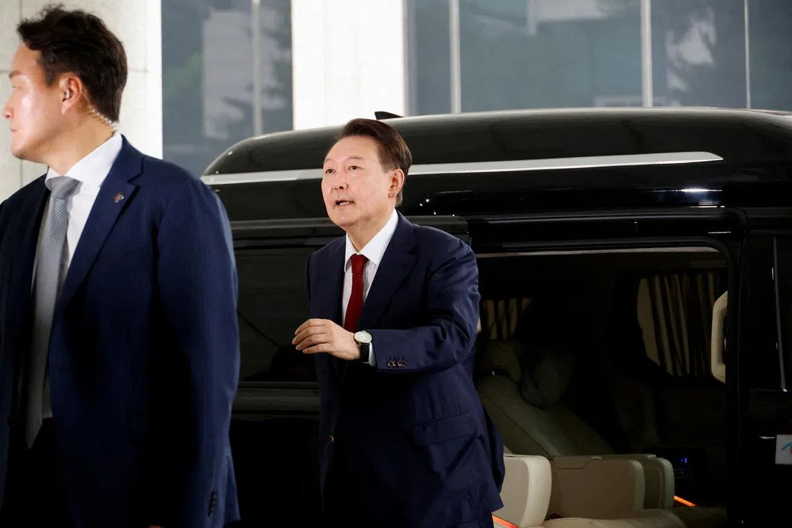 South Korea's former President Yoon Suk Yeol arrives at Seoul High Prosecutor's Office to attend questioning after being summoned as part of a probe by a special prosecutor into his botched attempt to declare martial law, in Seoul, South Korea, June 28, 2025. REUTERS/Kim Soo-hyeon/File Photo