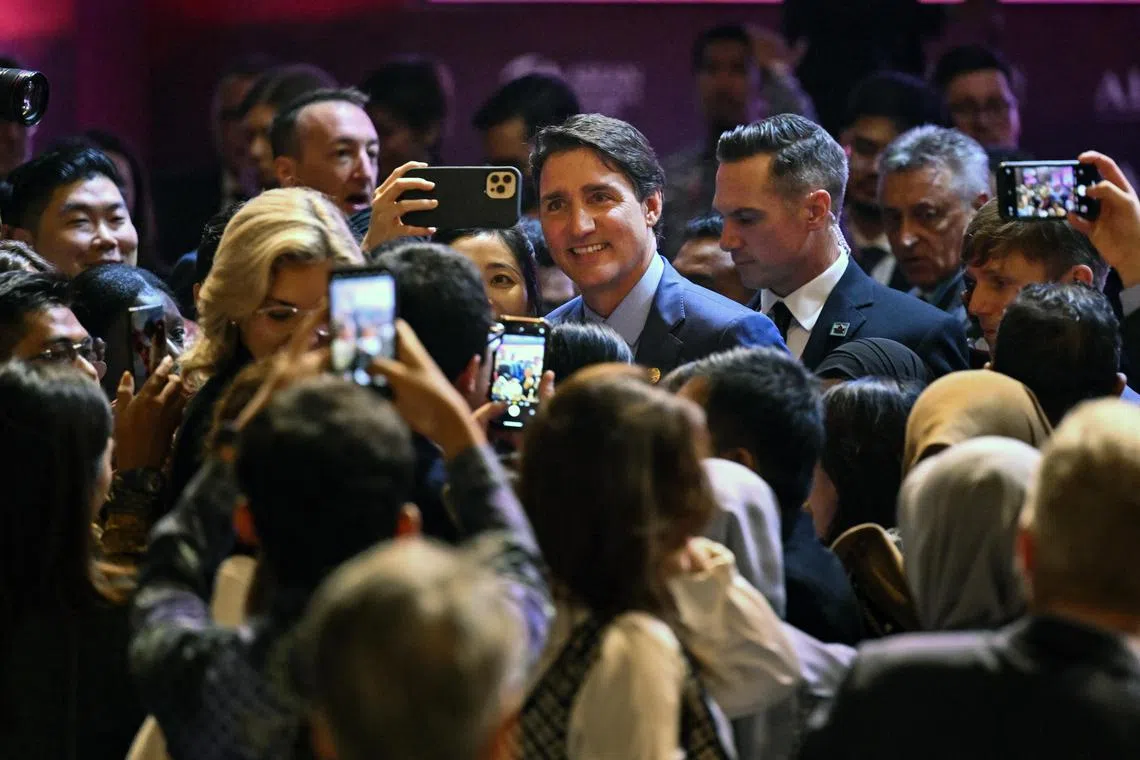 epa10844545 Canada's Prime Minister Justin Trudeau smiles at a participant’s camera during the leaders talk at the ASEAN-Indo Pacific Forum (AIPF) as part of the 43rd Association of Southeast Asian Nations (ASEAN) Summit in Jakarta, Indonesia, 06 September 2023. Indonesia will host the 43rd ASEAN Summit and related summits on 05 to 07 September 2023.  EPA-EFE/ADEK BERRY / POOL