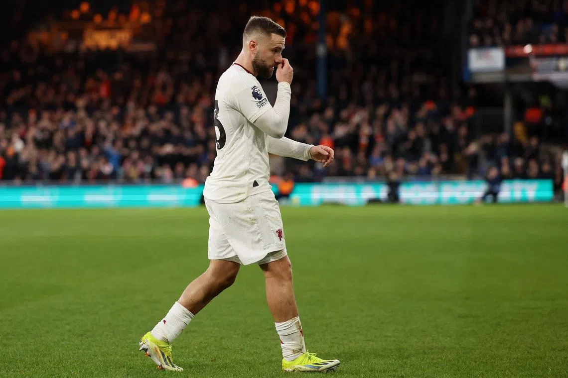 FILE PHOTO: Soccer Football - Premier League - Luton Town v Manchester United - Kenilworth Road, Luton, Britain - February 18, 2024 Manchester United's Luke Shaw walks off the pitch to be substituted due to injury REUTERS/Hannah Mckay/File Photo