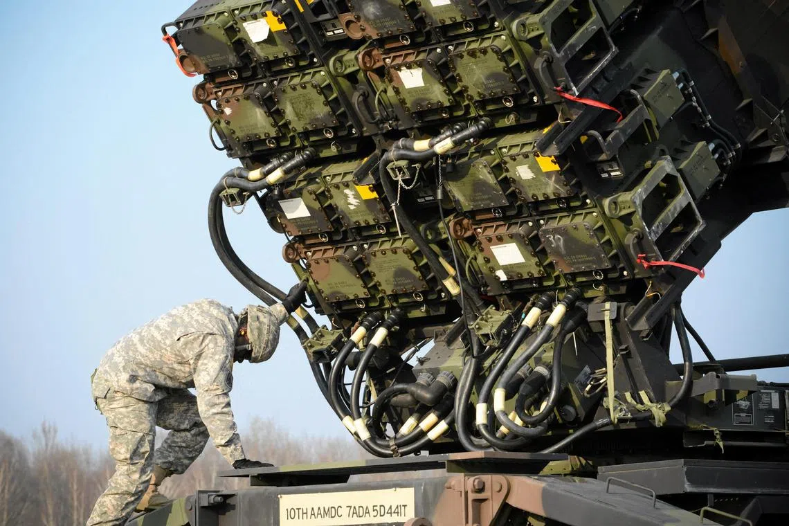 A United States soldier inspects a Patriot missile defence battery in this file photo taken on March 21, 2015.