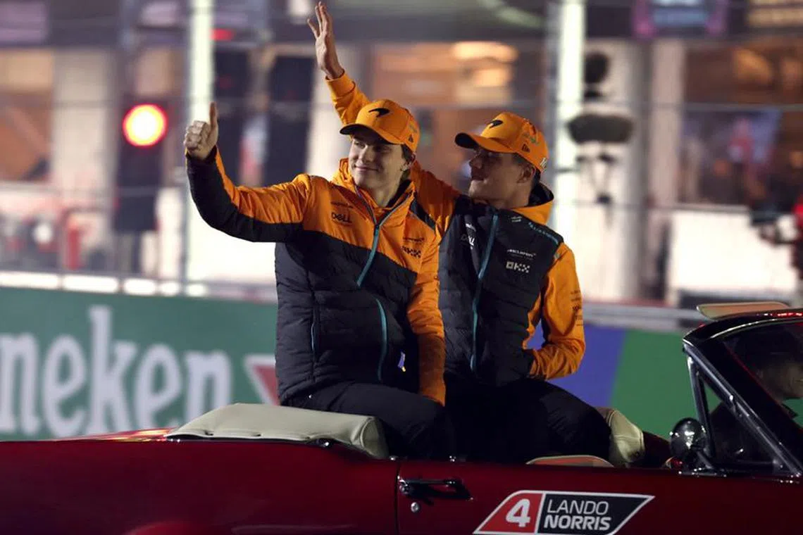 Formula One F1 - Las Vegas Grand Prix - Las Vegas Strip Circuit, Las Vegas, Nevada, U.S - November 18, 2023 McLaren's Lando Norris and Oscar Piastri during the drivers parade before the race REUTERS/Finn Blake