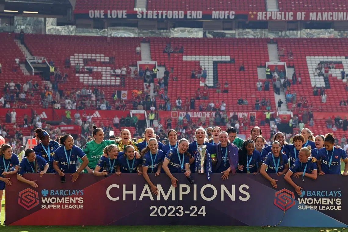 Chelsea celebrate winning the title after the Women's Super League match against Manchester United at Old Trafford on May 18, 2024.