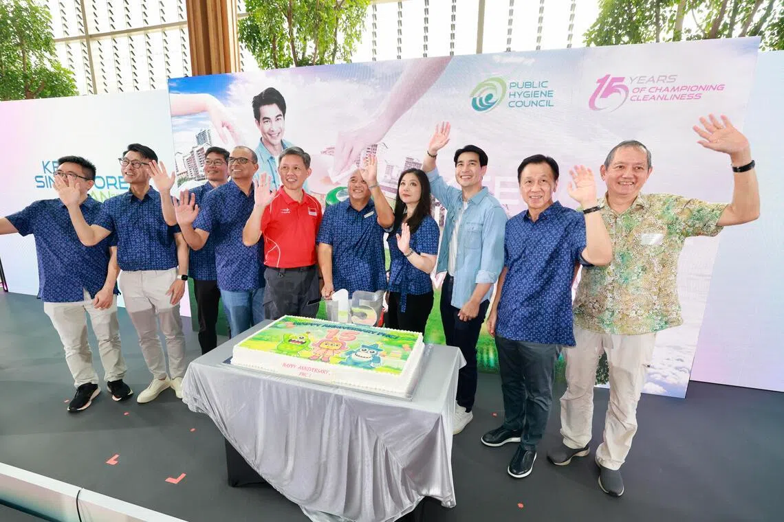 Coordinating Minister for Public Services and Defence Minister Chan Chun Sing (fifth from left) celebrates Public Hygiene Council’s (PHC) 15th anniversary at Geneo at Singapore Science Park.