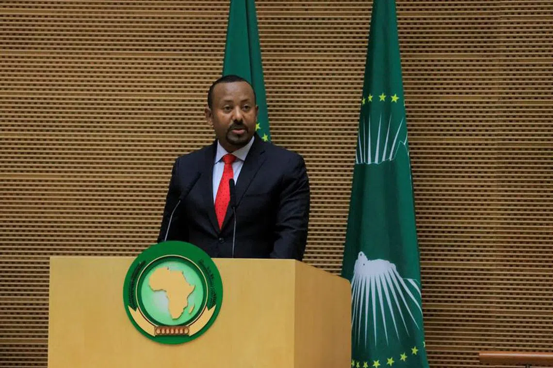 FILE PHOTO: Ethiopian Prime Minister Abiy Ahmed attends the 60th anniversary of the Organization of African Unity (OAU)/African Union (AU) at the African Union Commission (AUC) Headquarters in Addis Ababa, Ethiopia May 25, 2023. REUTERS/Tiksa Negeri/File Photo
