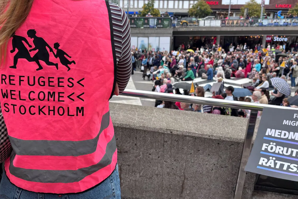Campaigners at a rally protest against the government's immigration policies before the upcoming elections in Stockholm, Sweden, August 30, 2026. Picture taken with a mobile phone. REUTERS/Simon Johnson