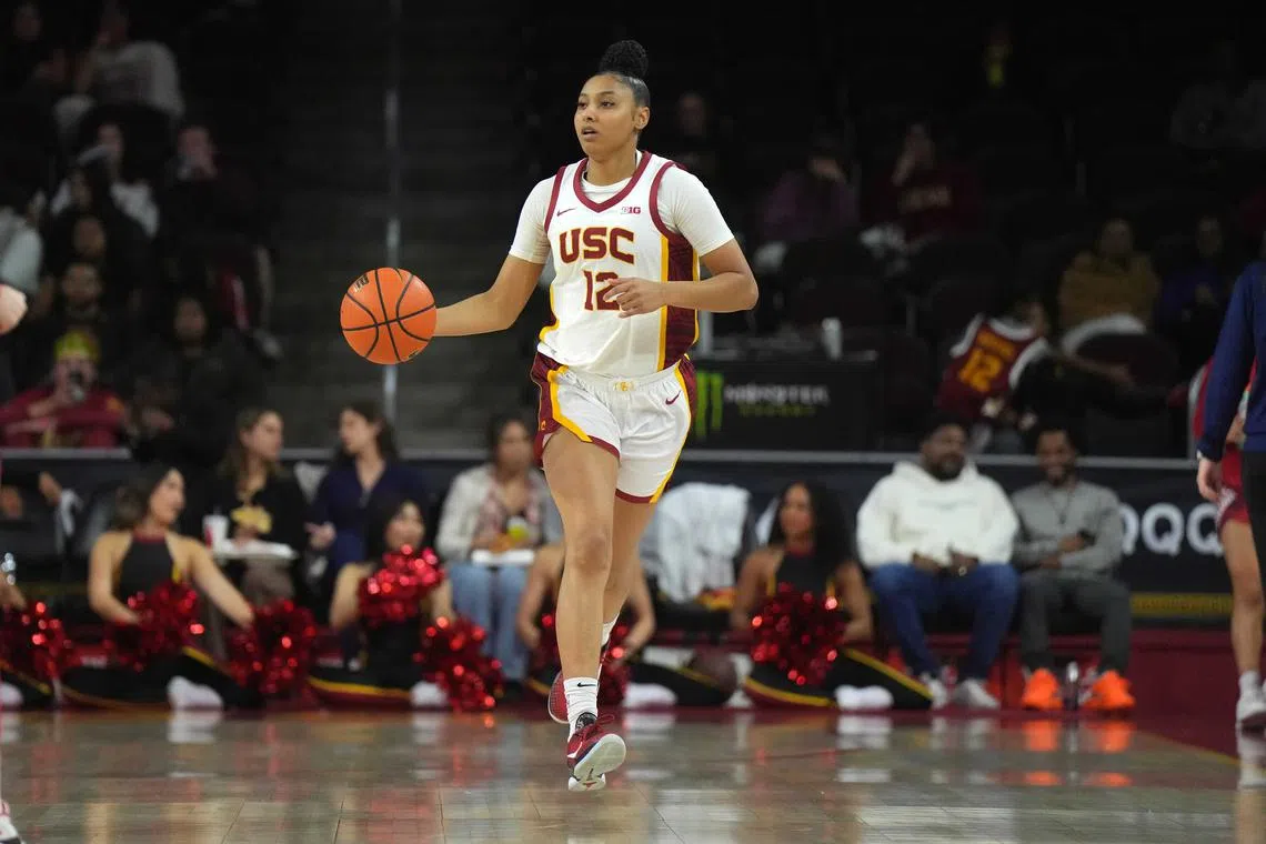 Dec 10, 2024; Los Angeles, California, USA; Southern California Trojans guard JuJu Watkins (12) dribbles the ball against the Fresno State Bulldogs in the second half at Galen Center. USC defeated Fresno State 89-40. Kirby Lee-Imagn Images/File Photo
