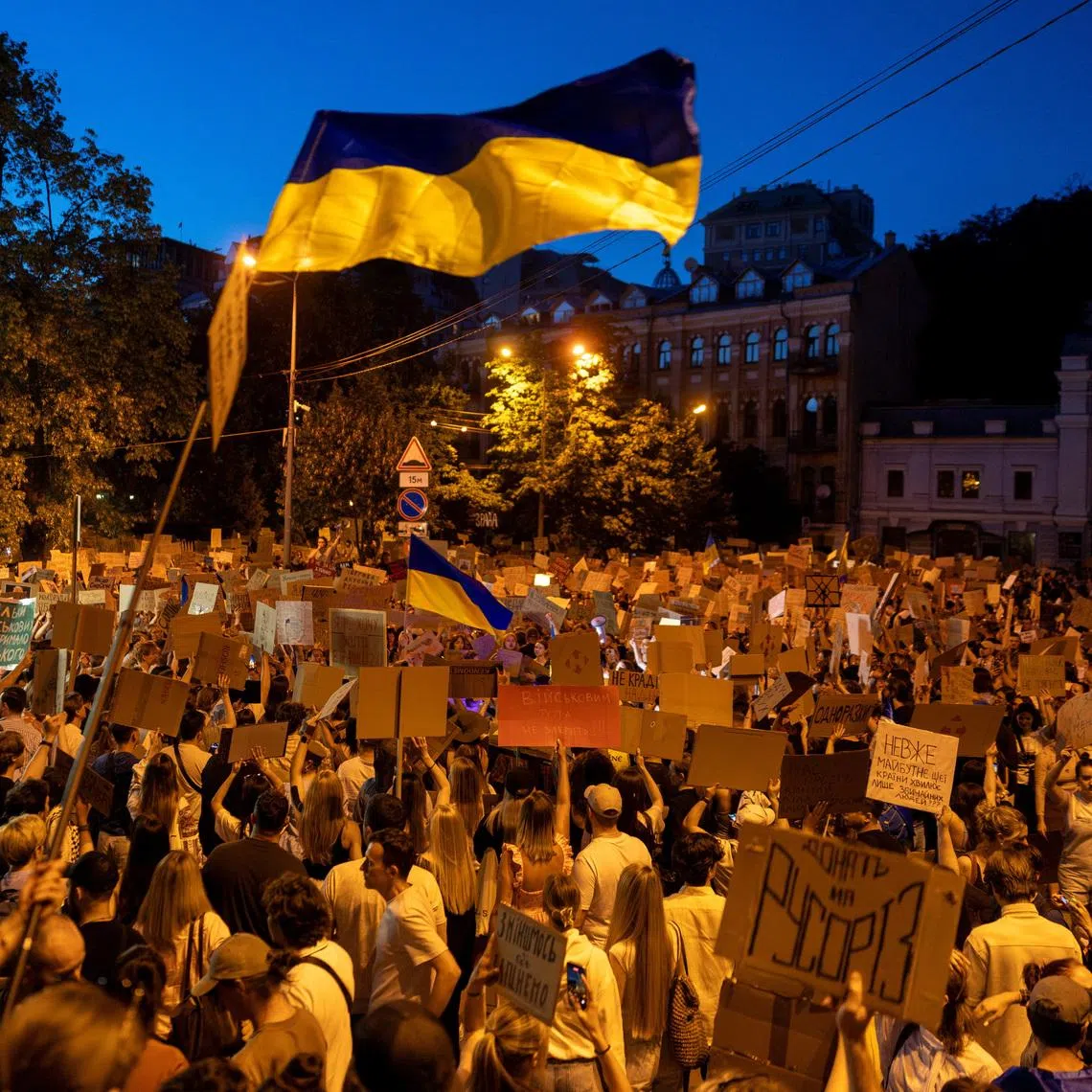 People protesting against Ukrainian President Volodymyr Zelensky’s decision to replace Mykhailo Fedorov as defence minister, in Kyiv, on July 18.