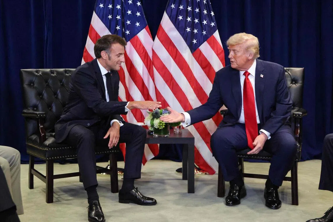 French President Emmanuel Macron (left) and US President Donald Trump meeting  on the sidelines of the UN General Assembly on Sept 23.