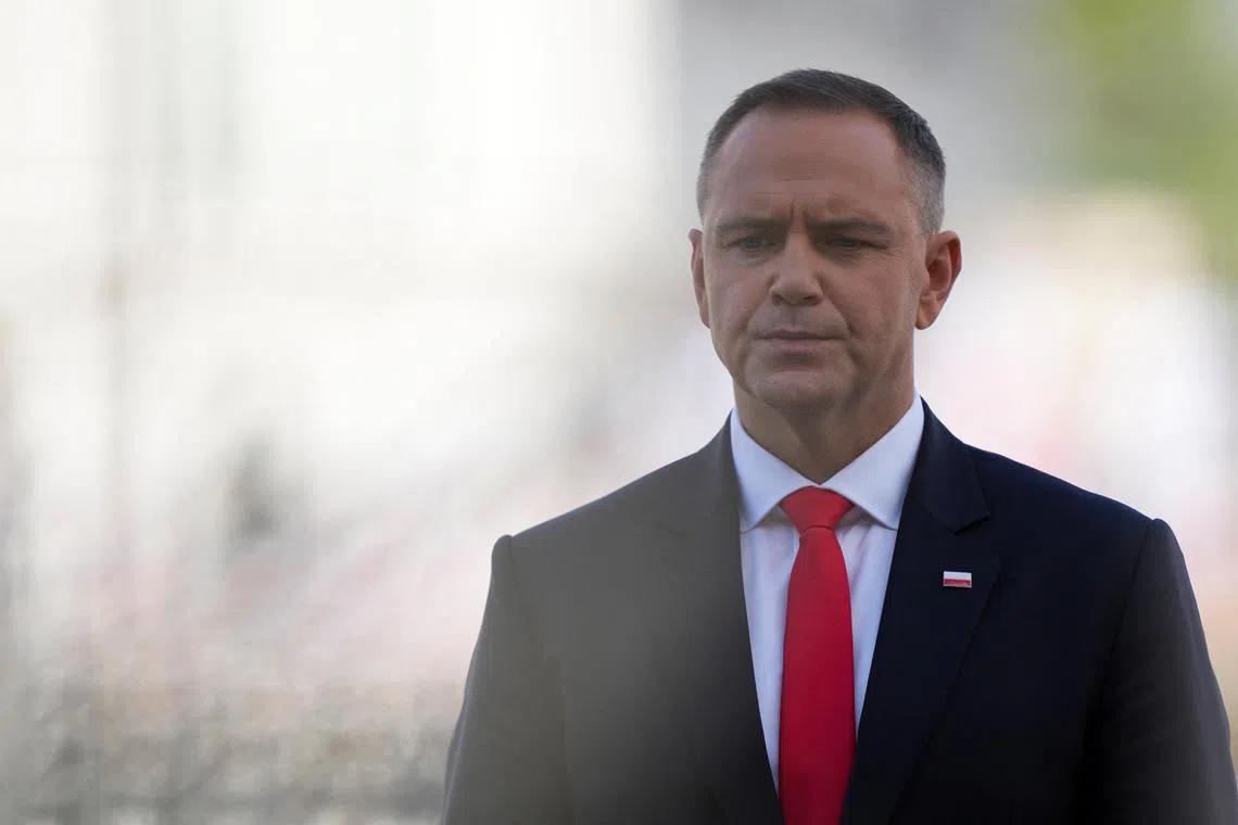 FILE PHOTO: Newly sworn-in Polish President Karol Nawrocki attends the ceremony of accepting the sovereignty over the Armed Forces for the five-year term, in Warsaw, Poland, August 6, 2025. REUTERS/Aleksandra Szmigiel/File Photo