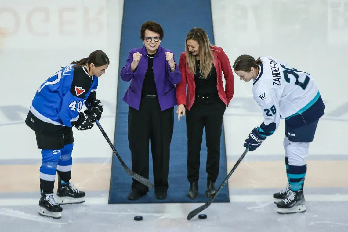 Tennis and ice hockey legends Billie Jean King (second from left) and Jayna Hefford dropping the puck in the first game of the inaugural Professional Women’s Hockey League between New York and Toronto on Dec 1. 