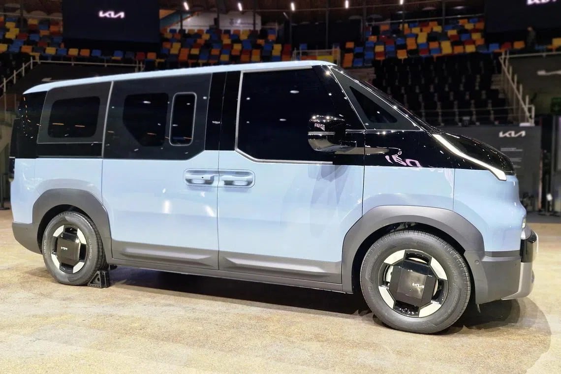 ctkia27a - PV5 Passenger 
Unabashedly boxy: The PV5 Passenger can be configured to carry six or seven occupants. 
Credit Christopher Tan.