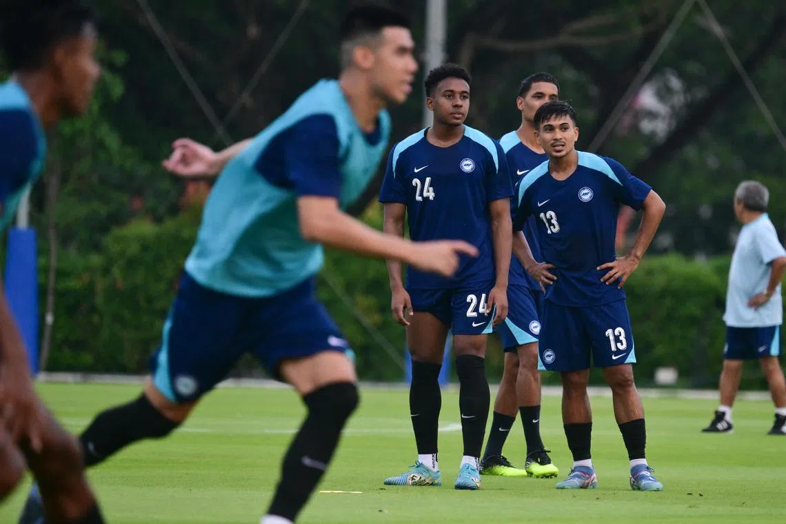 ST20241111_202413800203 dgsoc14 Azmi Athni/Deepanraj Ganesan//

Forwards Abdul Rasak (centre) and Taufik Suparno (right) training with The Lions at the Kallang Football Hub on Nov 11 ahead of the friendlies against Myanmar that will take place on Thursday, Nov 14, 2024. 

ST PHOTO: AZMI ATHNI