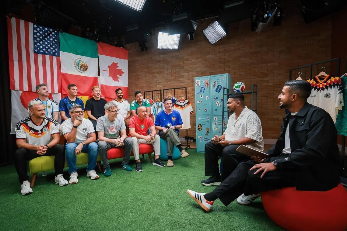 (From right) Zia-ul Raushan from Money FM 89.3 and ST sports reporter Deepanraj Ganesan hosting the World Cup Team Talk podcast show, featuring fans from participating nations, on May 22.