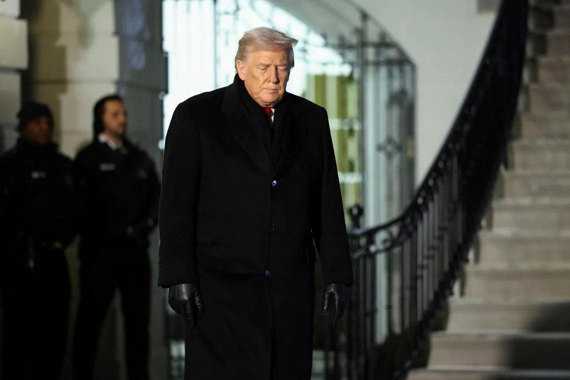 U.S. President Donald Trump walks as he departs for Davos, Switzerland from the South Lawn of the White House in Washington, D.C., U.S., January 20, 2026. REUTERS/Kevin Lamarque