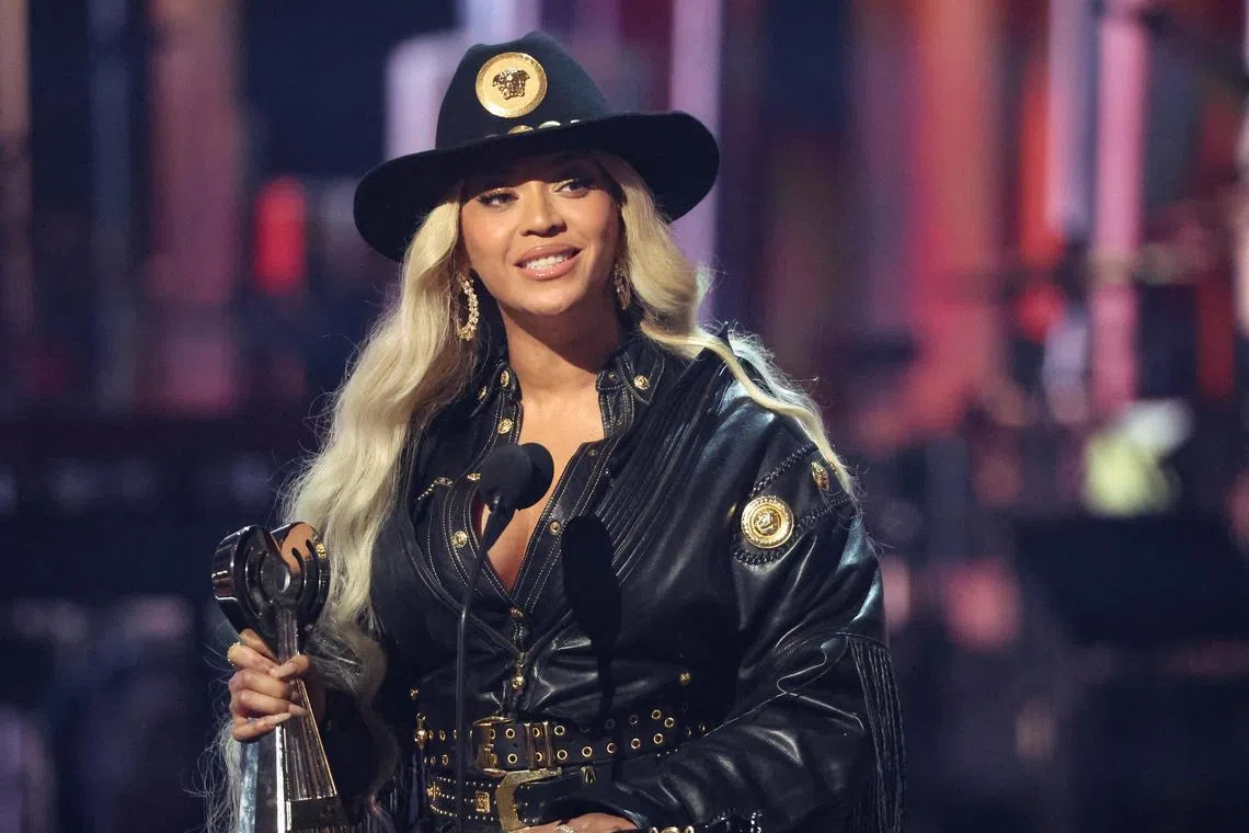 Beyonce has made history with Cowboy Carter, with the album earning No. 1 spots on both the Billboard 200 and Top Country Album charts.