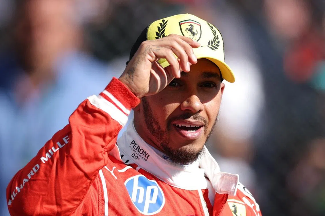 Formula One F1 - British Grand Prix - Silverstone Circuit, Silverstone, Britain - July 3, 2026 Ferrari's Lewis Hamilton celebrates after qualifying in pole position for the sprint race REUTERS/Andrew Boyers