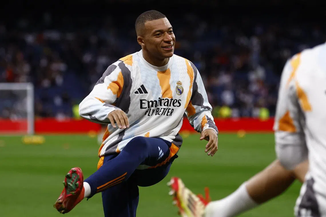 FILE PHOTO: Soccer Football - LaLiga - Real Madrid v Rayo Vallecano - Santiago Bernabeu, Madrid, Spain - March 9, 2025 Real Madrid's Kylian Mbappe during the warm up before the match REUTERS/Susana Vera/File Photo