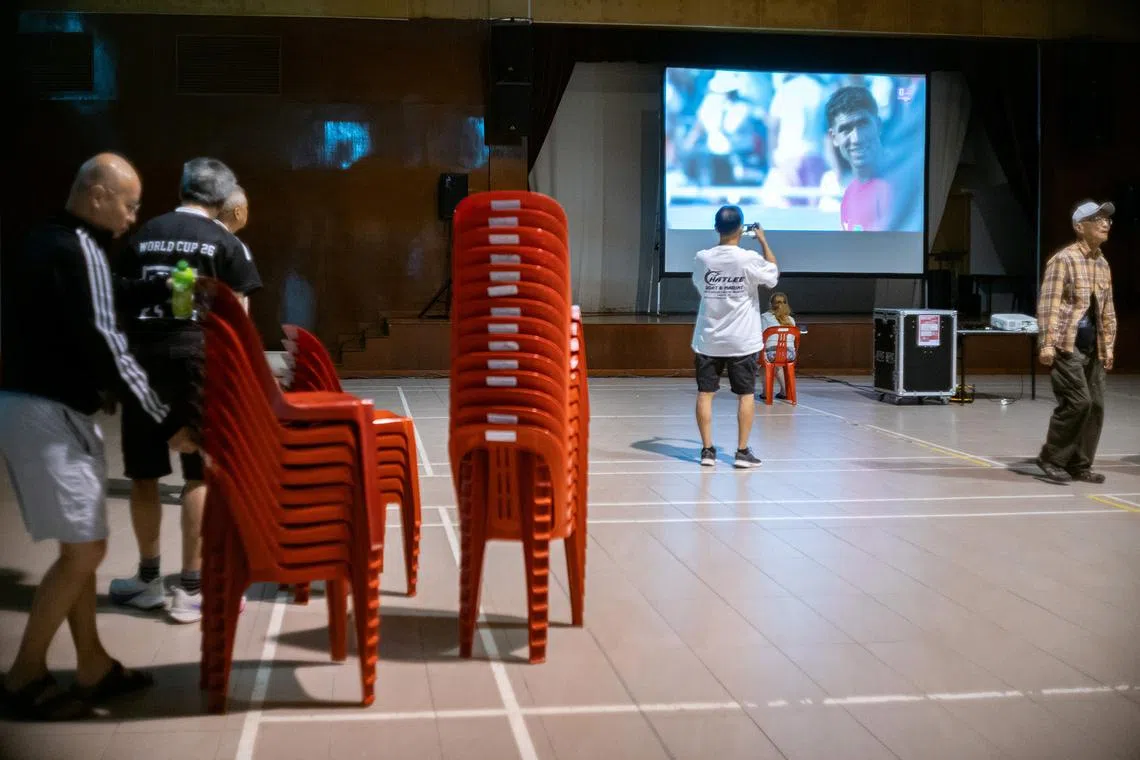 Fans stacking the chairs after the end lf the FIFA World Cup 2026 quaterfinals match between France and Morocco at Bukit Timah Community Club on July 10, 2026. ST PHOTO: BRIAN TEO