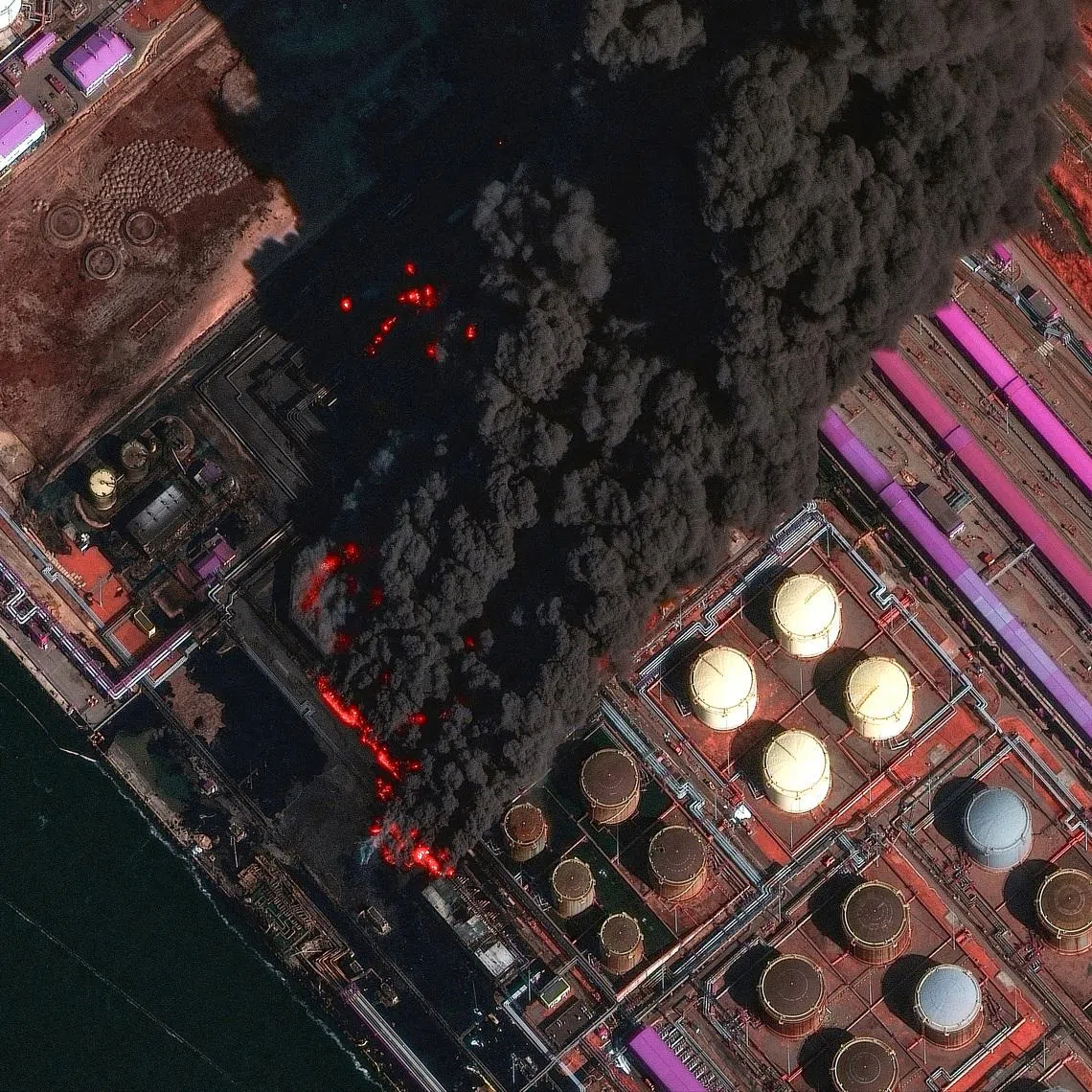 FILE PHOTO: A satellite near-infrared image shows smoke rising from Russia's Baltic port of Ust-Luga after a Ukrainian attack, in Ust-Luga, Leningrad Oblast, March 27, 2026. Vantor/Handout via REUTERS/File Photo