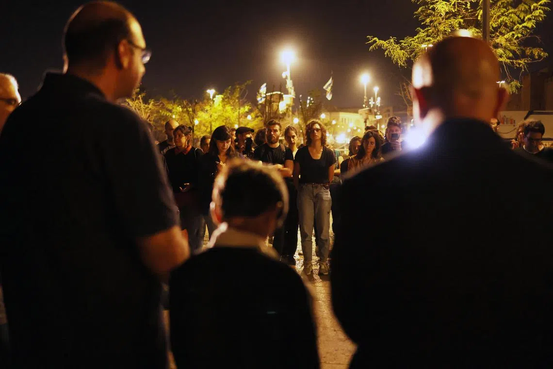 A multi-faith group of Israelis and Palestinians hold a 15 minutes silence for victims of the Oct 7 attack carried out by Hamas.