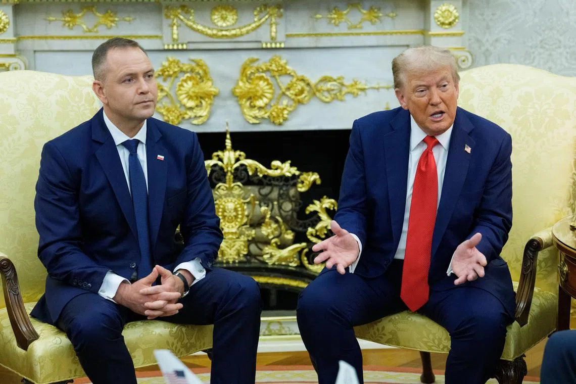 United States President Donald Trump (right) speaking to reporters at the White House on Sept 3, alongside Polish President Karol Nawrocki.