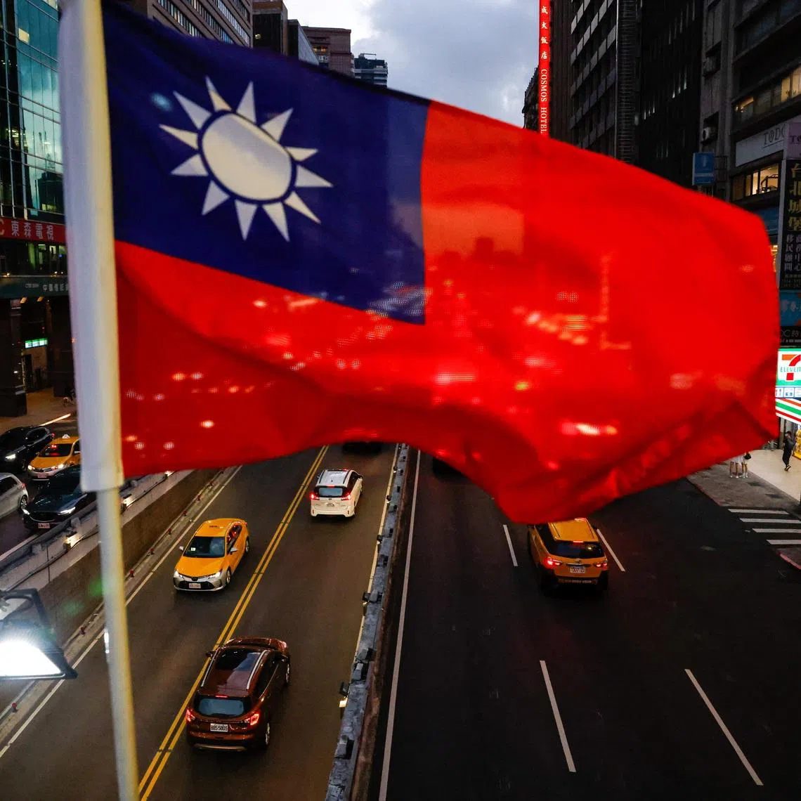 A Taiwan flag can be seen on an overpass ahead of National Day celebrations in Taipei, Taiwan, October 8, 2025. REUTERS/Ann Wang