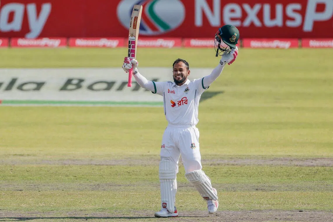 Bangladesh's Mushfiqur Rahim celebrates after scoring a century on the second day of the second Test against Ireland at the Sher-e-Bangla National Cricket Stadium in Dhaka on Nov 20, 2025.