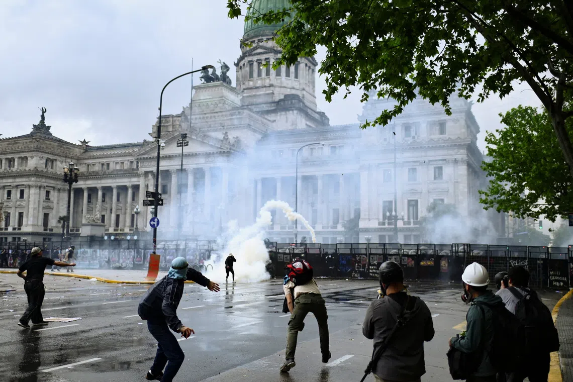 Demonstrators protest in support of the Argentine university community, demanding increased funding, living income for the sector, and against President Javier Milei's administration, in Buenos Aires, Argentina, October 15, 2026. REUTERS/Pedro Lazaro Fernandez