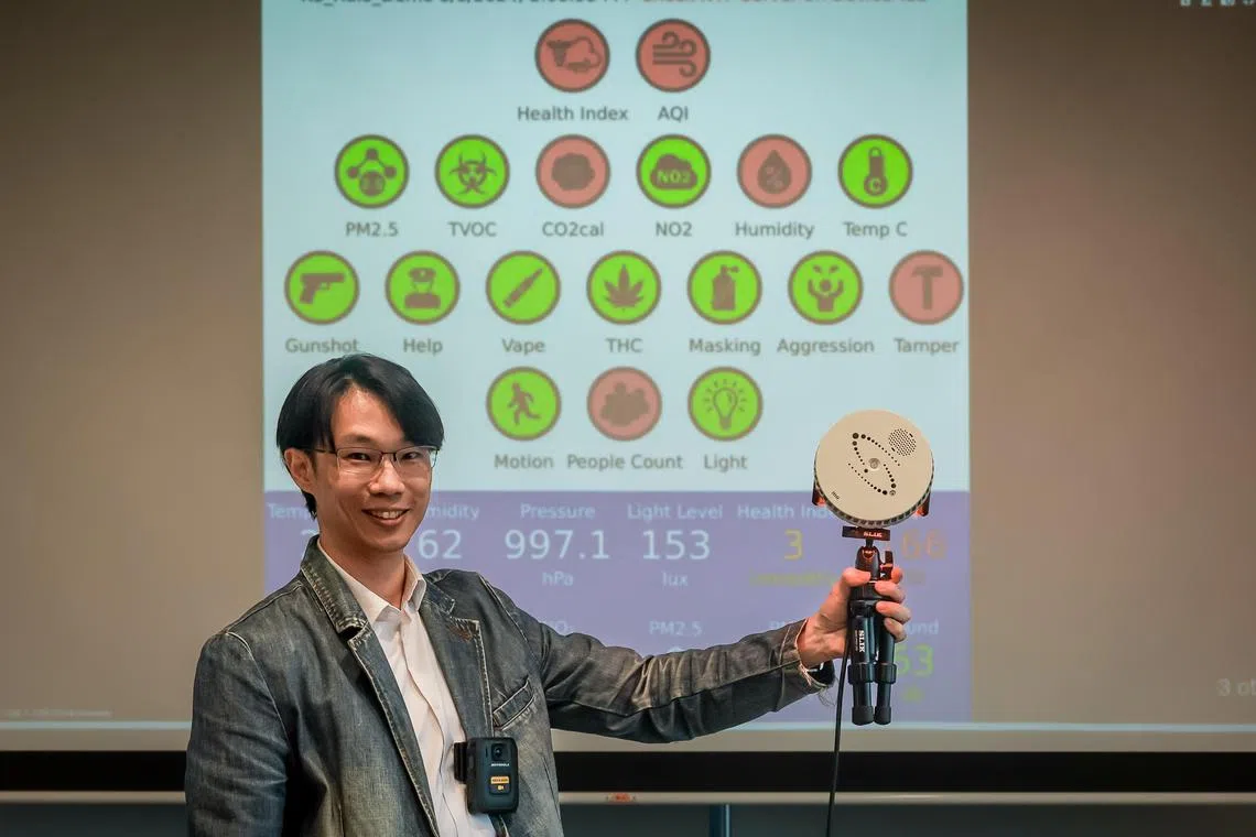 Choong Kit Soon, Presales Lead, APAC Channel Business, Motorola Solutions Singapore, holding his company?s Halo Smart Sensor at their office in MapleTree Business City II on Sep 26, 2024.