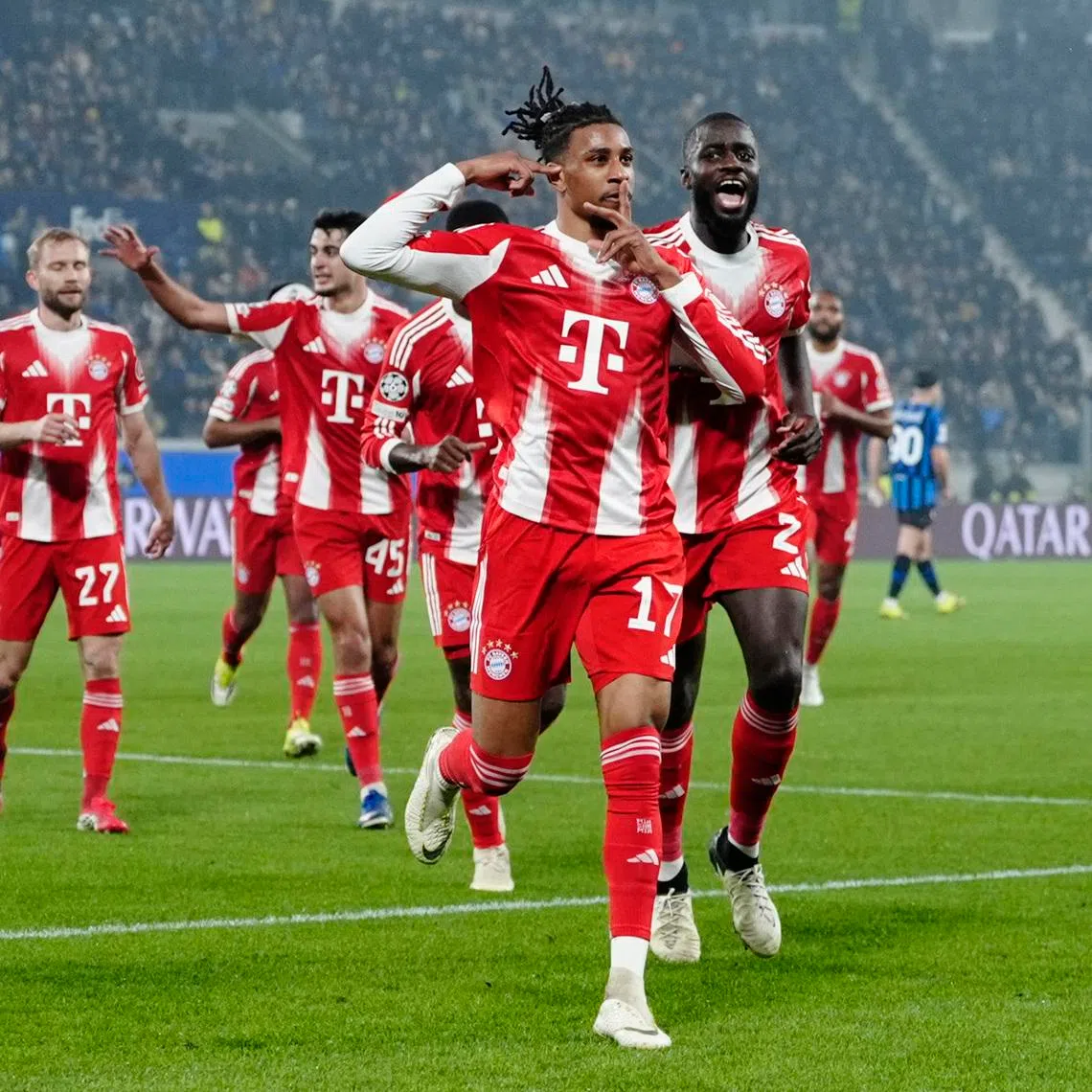 Soccer Football - UEFA Champions League - Round of 16 - First Leg - Atalanta v Bayern Munich - New Balance Arena, Bergamo, Italy - March 10, 2026 Bayern Munich's Michael Olise celebrates scoring their second goal REUTERS/Matteo Ciambelli