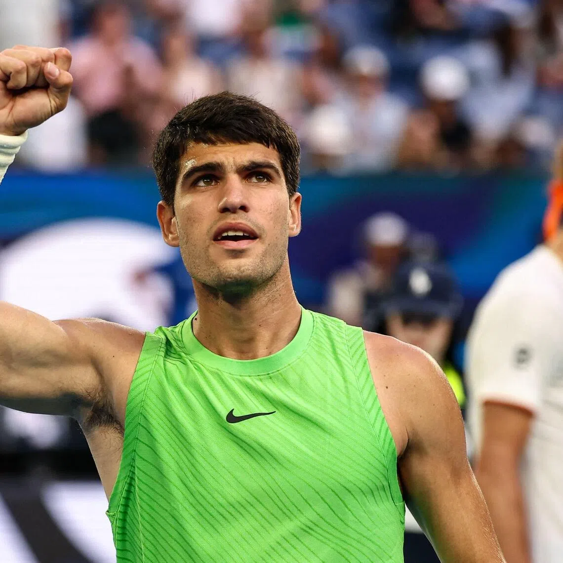 Spain's Carlos Alcaraz celebrating after winning his Australian Open semi-final 6-4, 7-6 (7-5), 6-7 (3-7), 6-7 against Alexander Zverev of Germany on Jan 30.