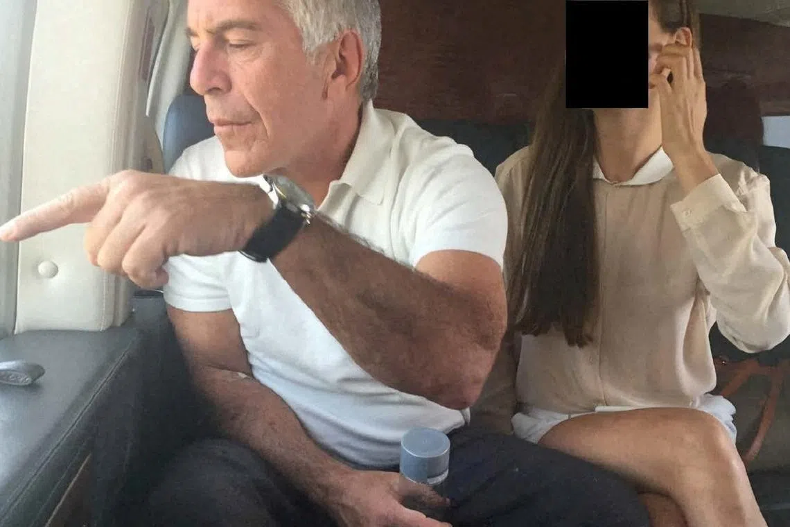 Late financier and convicted sex offender Jeffrey Epstein appears with a woman, whose identity has been obscured, in this image from the Epstein estate released by House Oversight Committee Democrats on Dec 18, 2025.