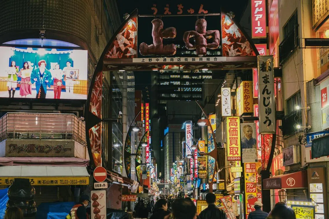 The trio are suspected of conspiring with others to steal three suitcases containing the cash on the evening of Jan 29 in Tokyo's Ueno district.