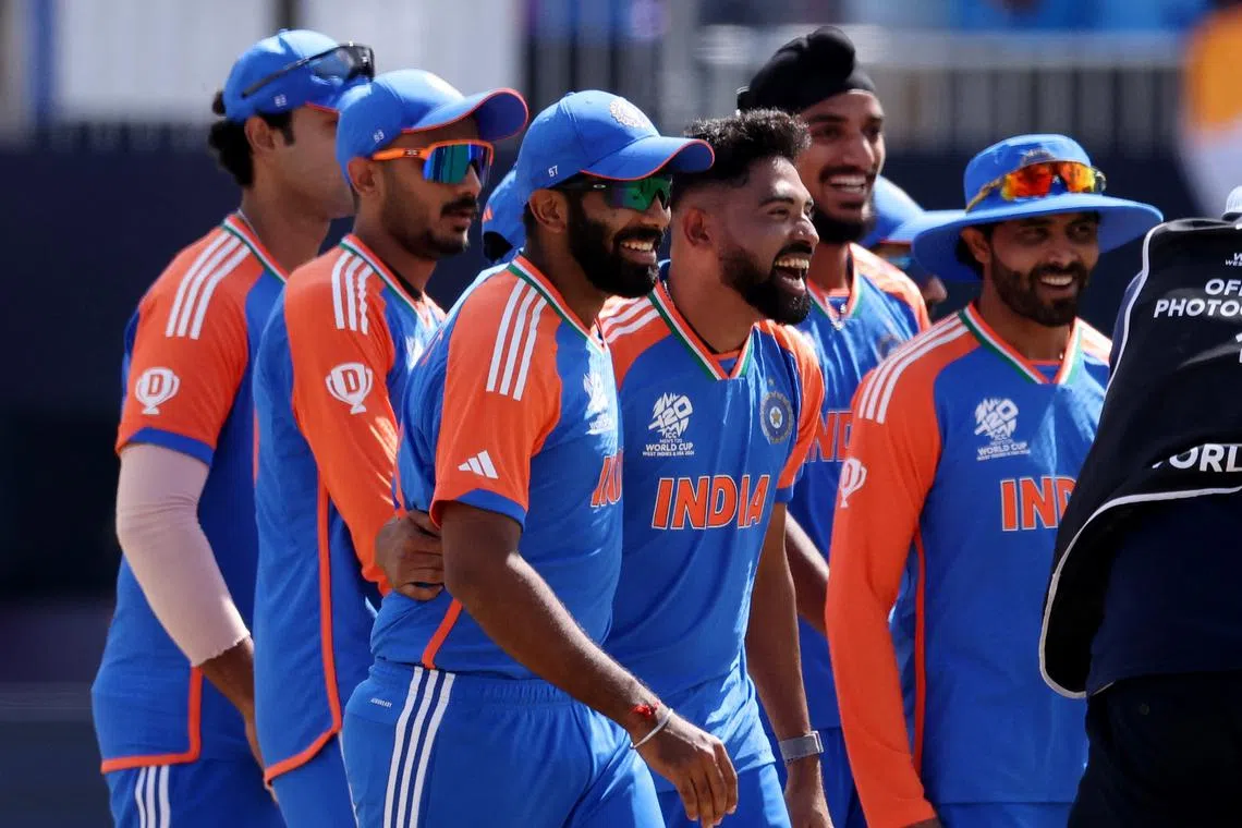 FILE PHOTO: Cricket - ICC T20 World Cup 2024 - Group A - India v Pakistan - Nassau County International Cricket Stadium, New York, United States - June 9, 2024 India players celebrate after winning the match REUTERS/Andrew Kelly/File Photo