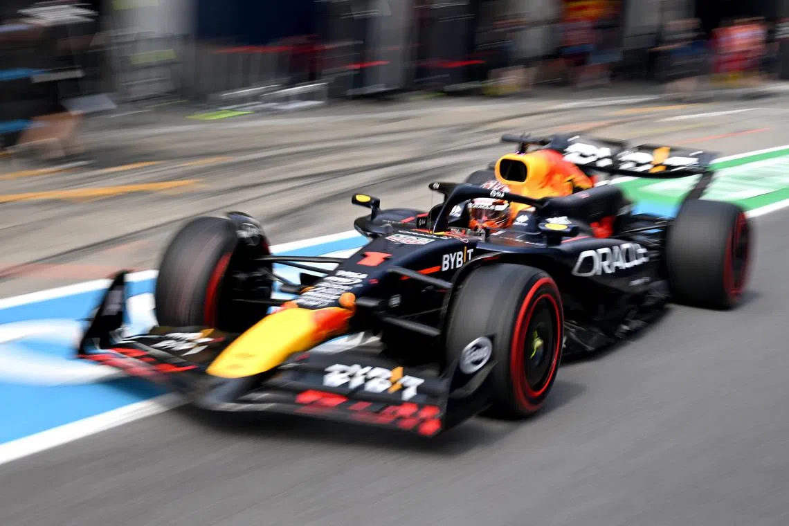 Red Bull's Max Verstappen drives through the pitlane during qualifying for the Austrian Grand Prix.