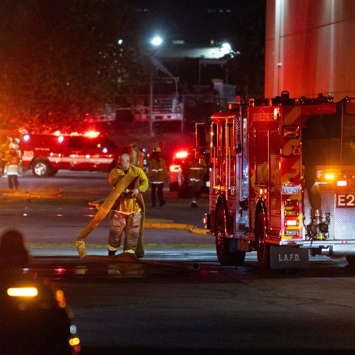 First responders at the scene of a helicopter crash in Chatsworth, Los Angeles, on Sept 15.