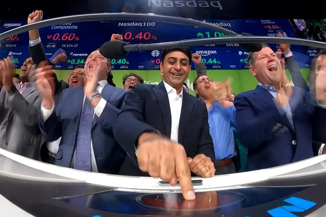 Chief executive Prashant Aggarwal (centre) said the group opted to list in the US to gain exposure to a larger and more diverse investor base.