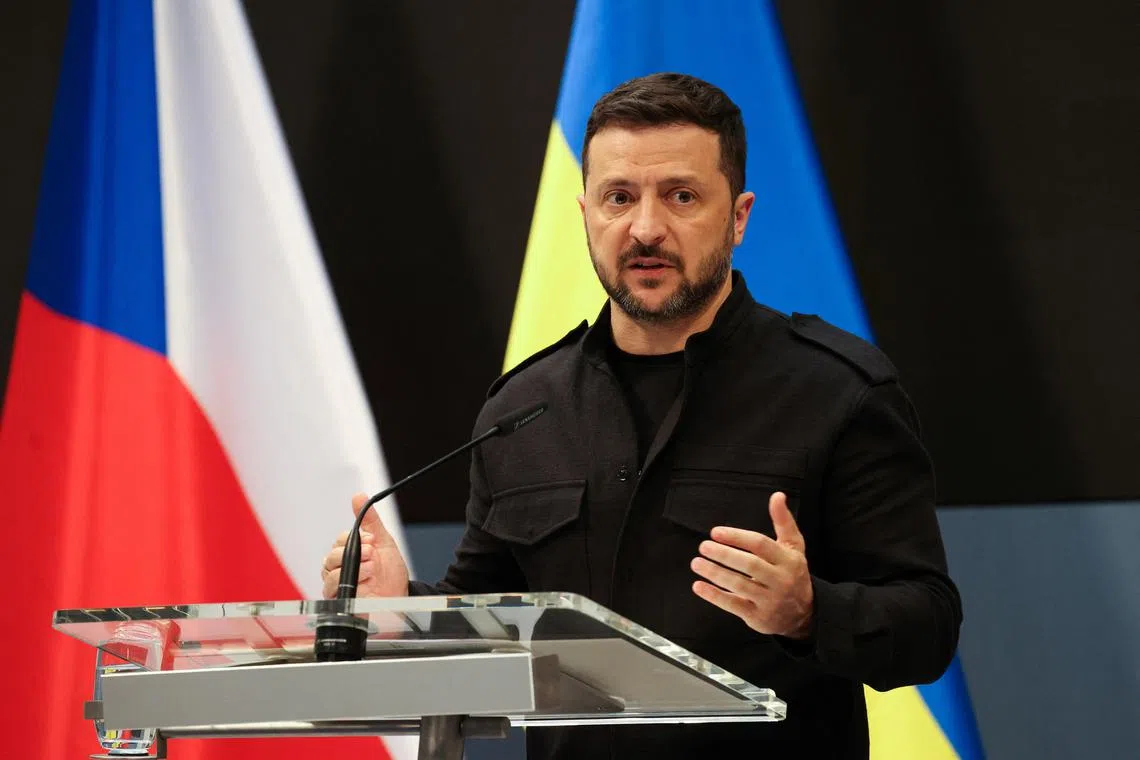 FILE PHOTO: Ukrainian President Volodymyr Zelenskiy holds a joint press conference with Czech Prime Minister Petr Fiala, in Prague, Czech Republic, May 5, 2025. REUTERS/Eva Korinkova/File Photo