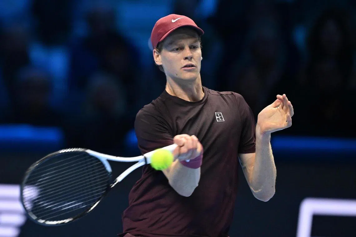 Jannik Sinner of Italy returning a shot during the men's singles semi-final match against Alex de Minaur of Australia at the ATP Finals in Turin on Nov 15. The Italian won 7-5, 6-2.