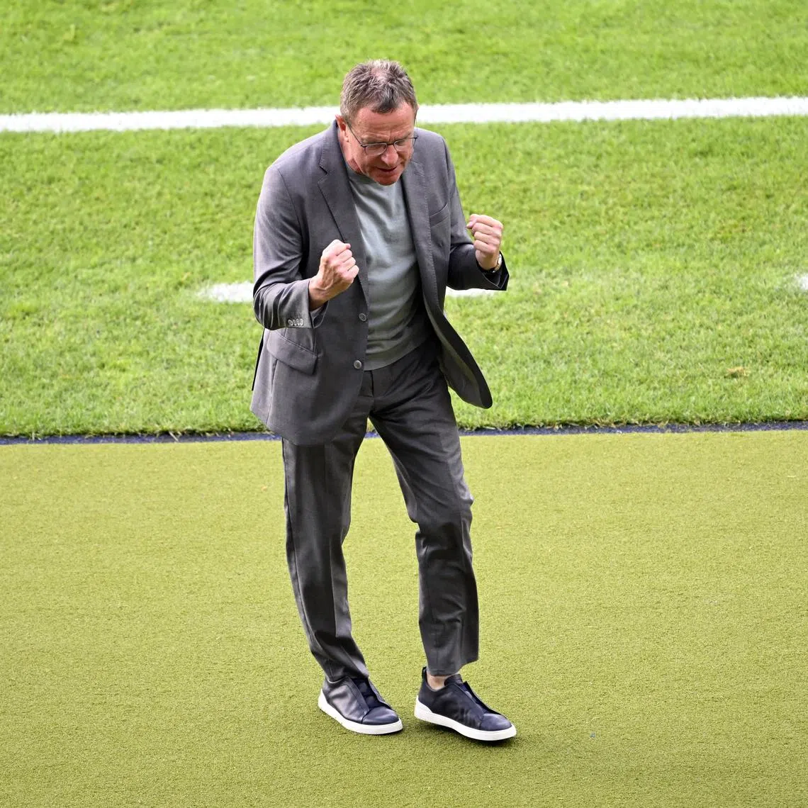 FILE PHOTO: Soccer Football - Euro 2024 - Group D - Poland v Austria - Berlin Olympiastadion, Berlin, Germany - June 21, 2024 Austria coach Ralf Rangnick celebrates after the match REUTERS/Fabian Bimmer/File Photo
