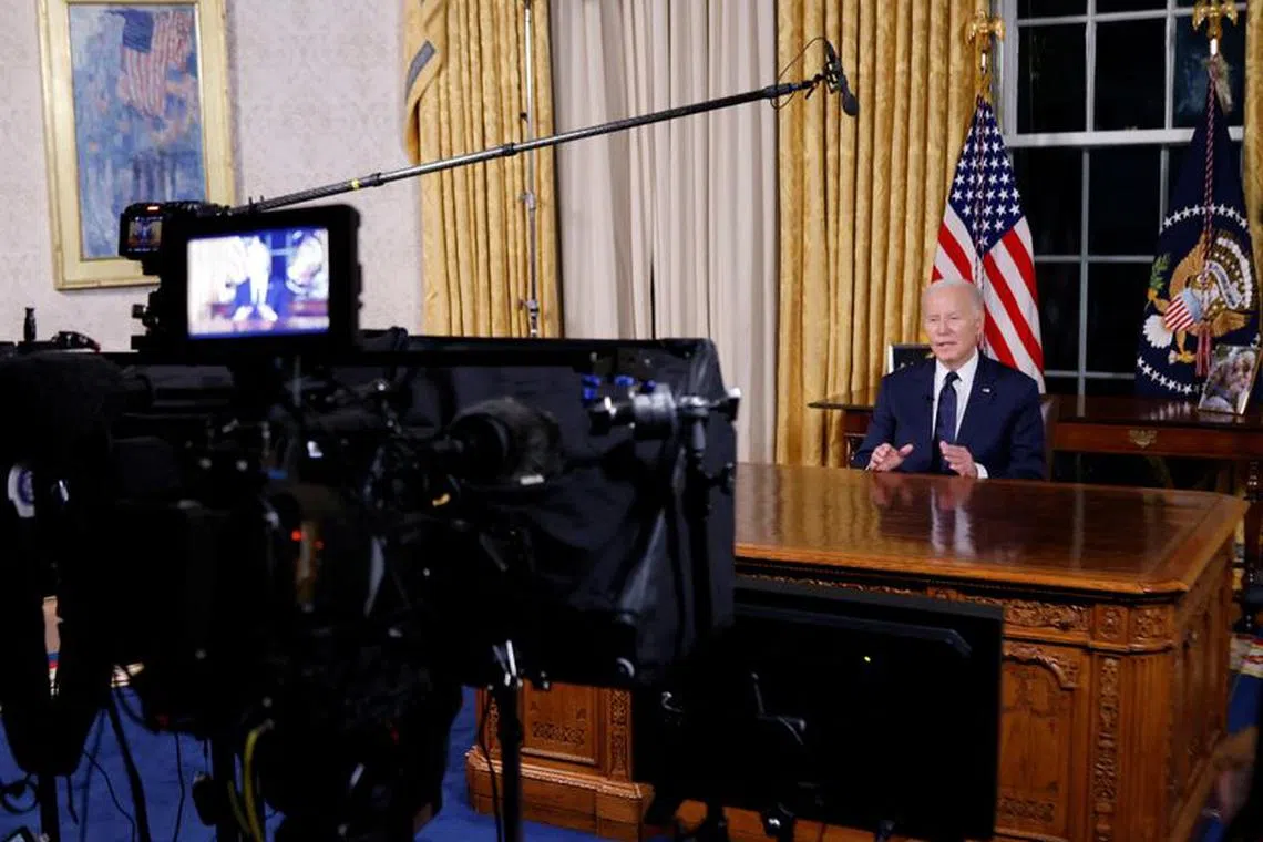 U.S.  President Joe Biden delivers a prime-time address to the nation about his approaches to the conflict between Israel and Hamas, humanitarian assistance in Gaza and continued support for Ukraine in their war with Russia, from the Oval Office of the White House in Washington, U.S. October 19, 2023. REUTERS/Jonathan Ernst/Pool/ File Photo