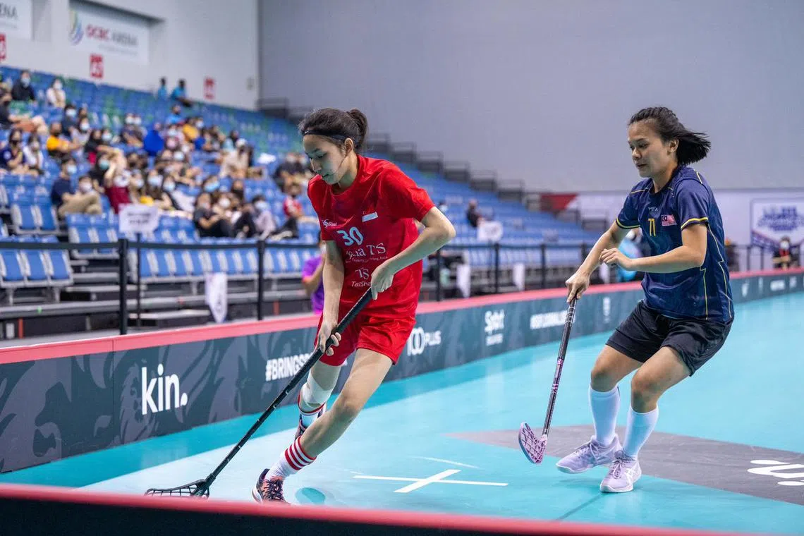Nasha Jeffri (left) is among eight floorballers making their world championship debut at the upcoming Dec 2-10 edition in Singapore's squad of 20.