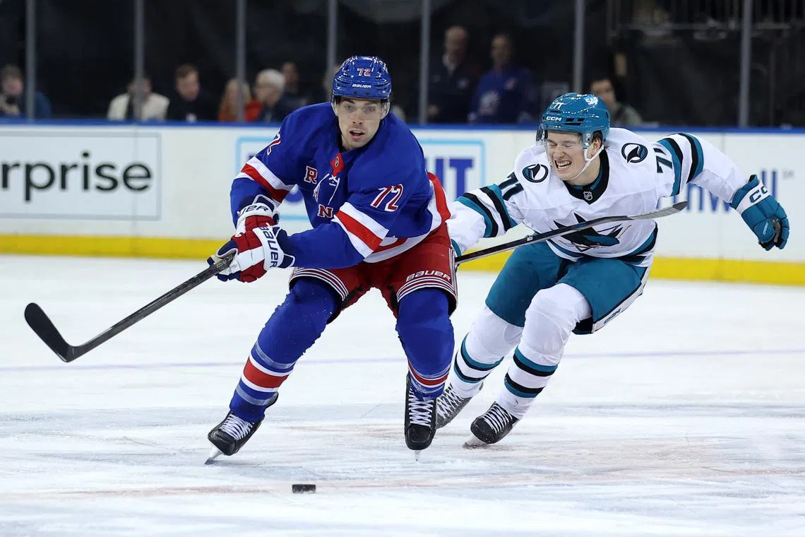 Nov 14, 2024; New York, New York, USA; New York Rangers center Filip Chytil (72) skates with the puck against San Jose Sharks center Macklin Celebrini (71) during the first period at Madison Square Garden. Mandatory Credit: Brad Penner-Imagn Images/ File Photo