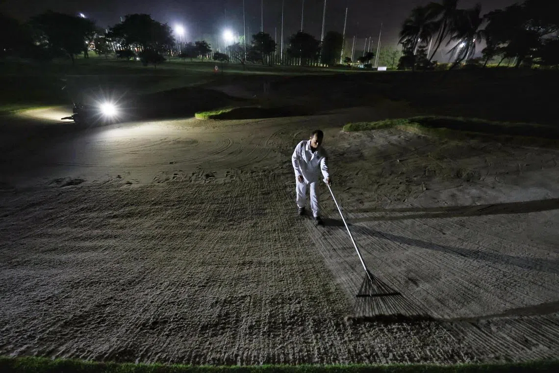 ST20240229_202495502530/rbcourse29/Rohit/Jason Quah

Agronomy workers getting the Sentosa Golf Club Tanjong course ready, in the early morning, for the HSBC Women's World Championship, on Feb 29, 2024.