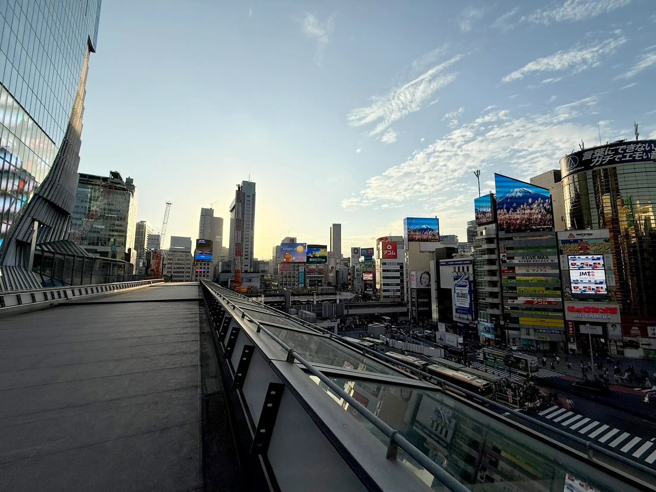 View from an elevated walkway that, when open, will allow commuters to walk across Shibuya without passing through ground level. This is part of a city design aiming to improve the flow of human traffic.