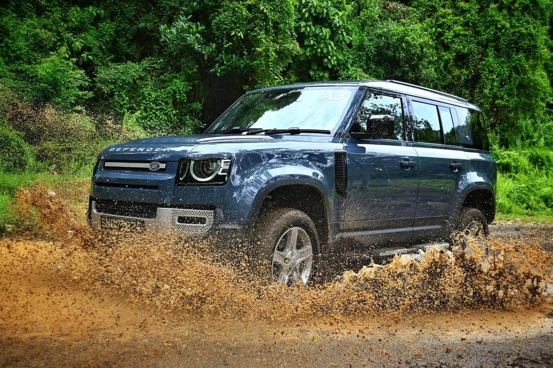 The Land Rover Defender tackling the off road terrain in Bukit Timah